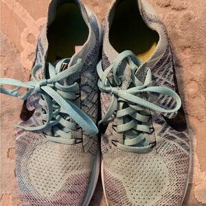 Nike Women’s Light Teal Flyknit Running Sneakers